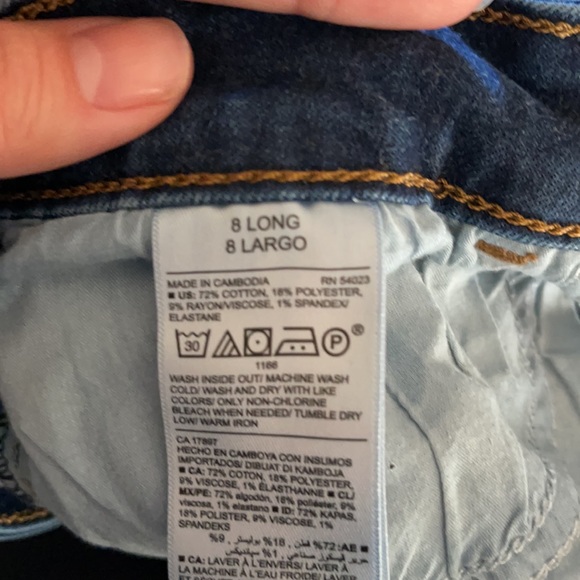 Non-distressed dark wash, mid-rise Old Navy Rockstar skinny jeans - Picture 2 of 2